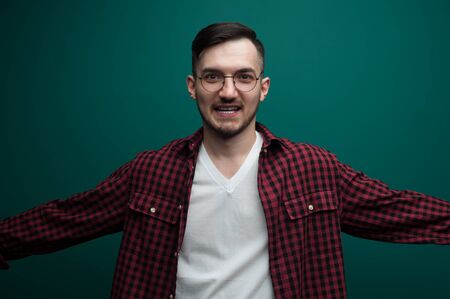 Portrait of a funny young interested man