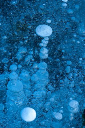 Close-up large and small white air bubblesの写真素材