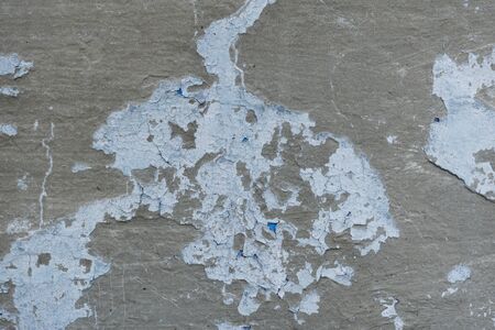 Close-up - gray stone wall in the old facade of the houseの写真素材