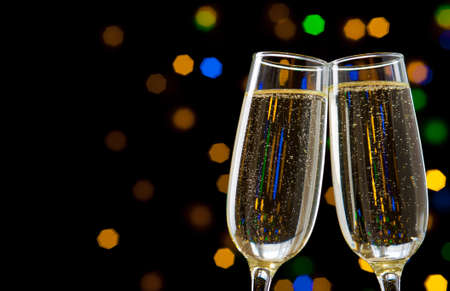 Close-up of two glasses with bubbly champagneの写真素材
