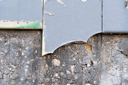 Close-up - gray stone wall in the old facade of the house - background image