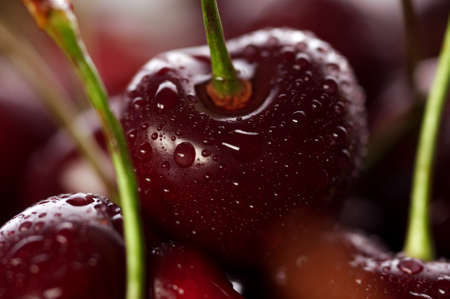 Fresh delicious cherries backgroundの写真素材
