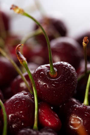 Fresh delicious cherries backgroundの写真素材