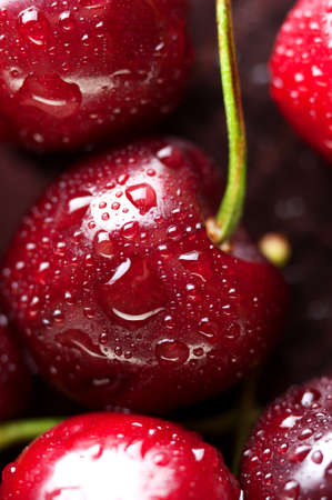 Fresh delicious cherries backgroundの写真素材