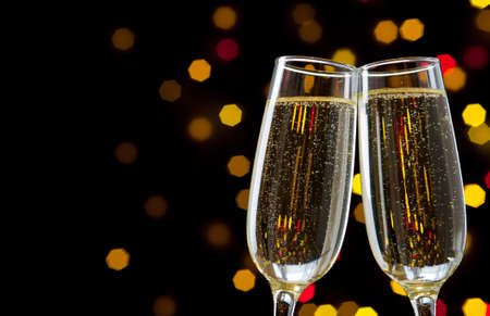 Close-up of two glasses with bubbly champagneの写真素材