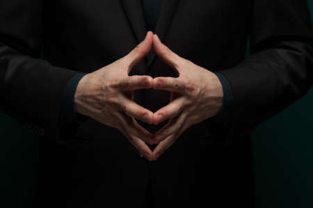 Man holding an invisible object on palmsの写真素材