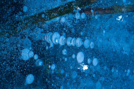 Close-up large and small white air bubblesの写真素材
