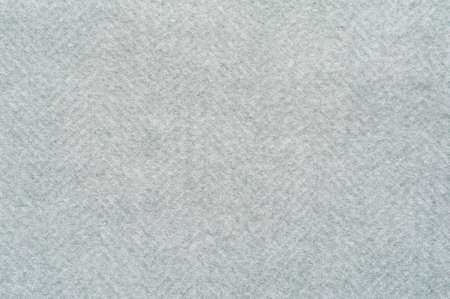Close-up fragment of warm woolen fabric. Concept of warm everyday things.の写真素材