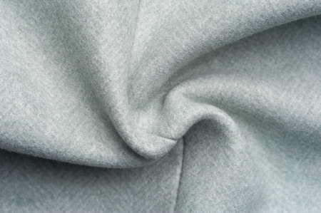 Close-up fragment of warm woolen fabric. Concept of warm everyday things.の写真素材