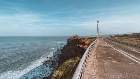 Aerial view of the road along the Atlantic Ocean in Portugal.の素材