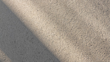 Concrete texture background. Floor surface with shadow from sun light.の素材
