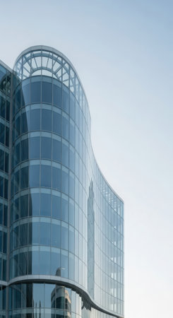 Glass facade of a modern office building. Perspective view of modern office building.の素材
