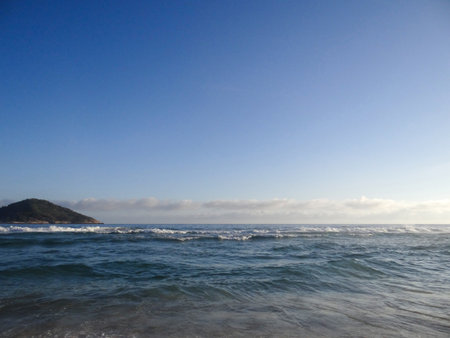 beautiful seascape in the morning on a background of blue skyの写真素材