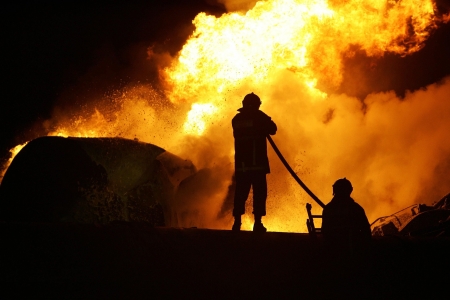 KILKIS,GREECE - MAY 9,2007: Fire-fighters trains extinguishing a fire のeditorial素材