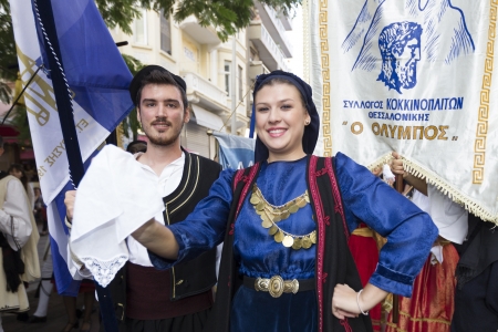 THESSALONIKI, GREECE - OCT 14, 2012 :Greek folklore dancers - street parade during the event of "celebrating 100 years since the liberation of Thessaloniki"のeditorial素材