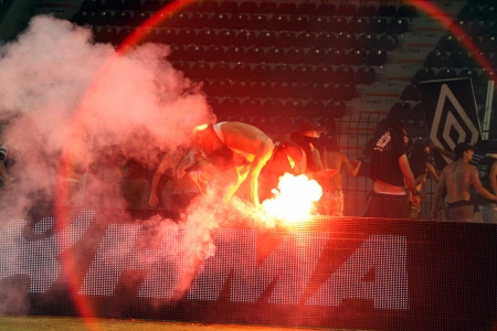 THESSALONIKI, GREECE-AUG 23, 2012:Clashes PAOK Thessaloniki and Rapid Vienna fans and the police before UEFA Europe League Playoff Football Match at Toumba Stadium のeditorial素材