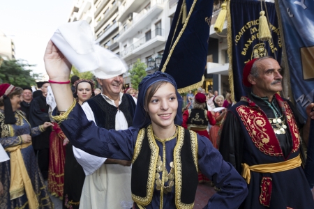 THESSALONIKI, GREECE - OCT 14, 2012: Greek folklore dancers - street parade during the event of のeditorial素材