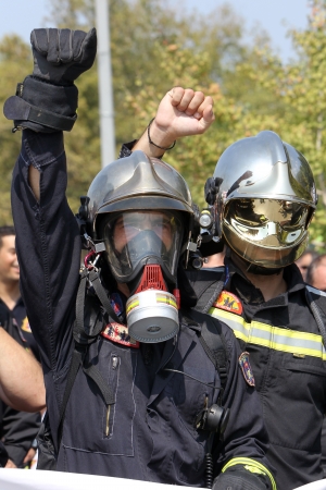 THESSALONIKI,GREECE - SEPT 08, 2012: Policemen, firefighters and port policeman protest in Thessaloniki against further cuts on their payroll のeditorial素材
