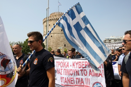 THESSALONIKI,GREECE - SEPT 08, 2012: Policemen, firefighters and port policeman protest in Thessaloniki against further cuts on their payroll on Sept 08, 2012 in Thessaloniki, Greece.のeditorial素材