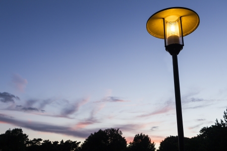 lantern lit street with cloundy skyの写真素材