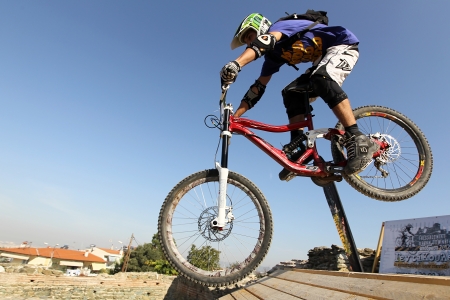 THESSALONIKI,GREECE - SEPT 30, 2012: Unidentified  bikers take part Yedi Kule Runaway competition in Thessaloniki during Urban Downhillのeditorial素材