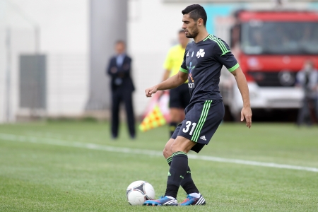 KOMOTINI,GREECE-SEPT 15, 2012:Nikos Spyropoulos of Panathinaikos in action during the soccer match between Panthrakikos and Panathinaikos at Komotini stadium のeditorial素材