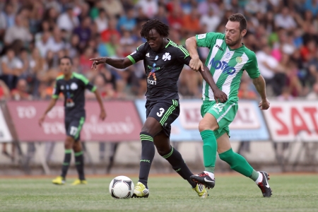 KOMOTINI,GREECE-SEPT 15, 2012: A.Ladakis of Panthrakikos (R)in action with Ibrahim Sissoko of Panathinaikos (L)during the  soccer match between Panthrakikos and Panathinaikos at Komotini stadium のeditorial素材