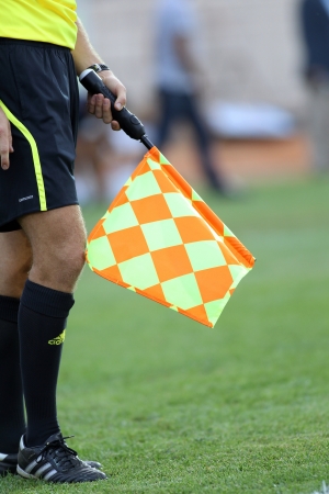 KOMOTINI,GREECE-SEPT 15, 2012: Assistant referees Iordanis Dimitriadis in action during the soccer match between Panthrakikos and Panathinaikos at Komotini stadium のeditorial素材
