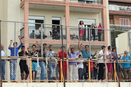 KOMOTINI,GREECE-SEPT 15, 2012: Fans of Panthrakikos during the soccer match between Panthrakikos and Panathinaikos at Komotini stadium のeditorial素材