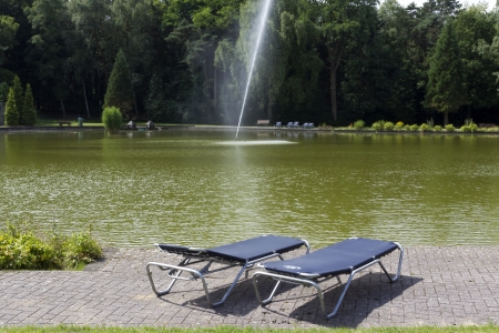 lounging by a lake の写真素材