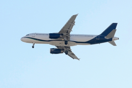 SX-OAR Airbus A320-232 passenger plane flying in the blue skyの写真素材