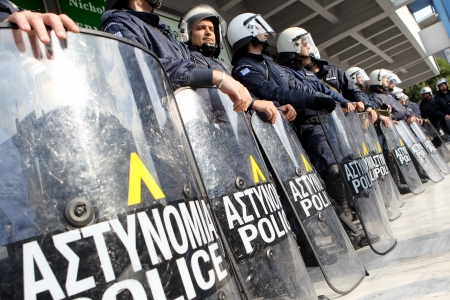 THESSALONIKI,GREECE - NOV,15 2012 : Municipal workers gesture during a demonstration against the presence of a German deputy labour minister Hans-Joachim Fuchtel, in Thessaloniki on 15 November, 2012 のeditorial素材