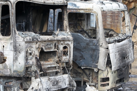 HALKIDIKI,GREECE-FEB,17,2013:Group of 40 men threw molotov cocktails and set fire to equipment at the Hellenic Gold site, damaging containers, cars and trucks, in the northern region of Halkidiki のeditorial素材