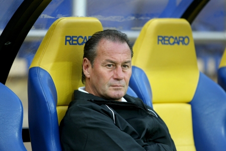 KHARKIV, UKRAINE -AUG 07:Stevens head coach of PAOK during the UEFA Champions League soccer match METALIST vs PAOK at Metalist Arena on August 07,2013 in Kharkiv, Ukraine.のeditorial素材