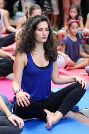 THESSALONIKI, GREECE - SEPT 22 : People perform yoga training during the Day without Car outdoor activities on September 22, 2013 Thessaloniki, Greece.のeditorial素材