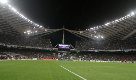 ATHENS, GREECE - NOV 24 : Interior view of the full OAKA Stadium during the UEFA Champions League group stage match Panathinaikos vs Barcelona on November 24, 2010 in Athens, Greeceのeditorial素材