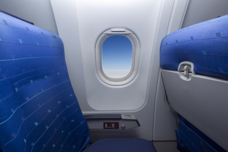 Airplane seat and window inside an aircraft..shal low DOFの写真素材