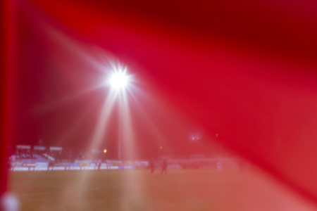 CHANIA, GREECE - FEB 2 : Stadium lights through the red corner flag during the Greek Superleague game Platanias vs Paok on February 2, 2014.のeditorial素材
