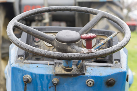 A vintage tractor steering wheelの写真素材