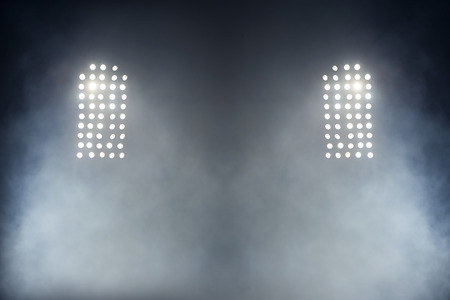Stadium lights against dark night sky backgroundonの写真素材