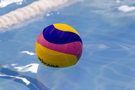 THESSALONIKI, GREECE MAR 5, 2014 : A water polo ball floating on the water in a pool during the water polo game PAOK vs Nereas on March 5, 2014.のeditorial素材