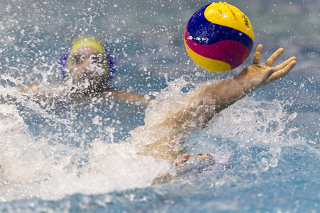 THESSALONIKI, GREECE MAR 5, 2014 : A player of PAOK in action during the Greek League water polo game PAOK vs Nereas on March 5, 2014.のeditorial素材