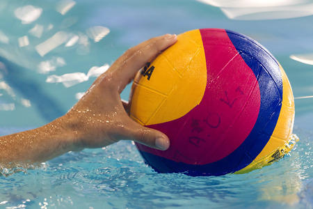 THESSALONIKI, GREECE MAR 5, 2014 : Close-up on a hand holding the water polo ball during the game PAOK vs Nereas on March 5, 2014.のeditorial素材