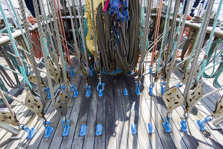 Sea hemp ropes and pulleys on the old nautical vessel