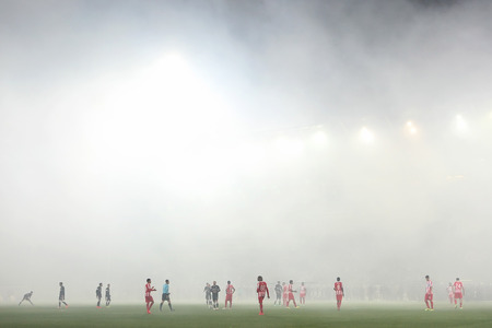 THESSALONIKI, GREECE APRIL 16, 2014 : Smoke all over the stadium during the Greek Cup Semi Final match PAOK vs Olympiacosのeditorial素材