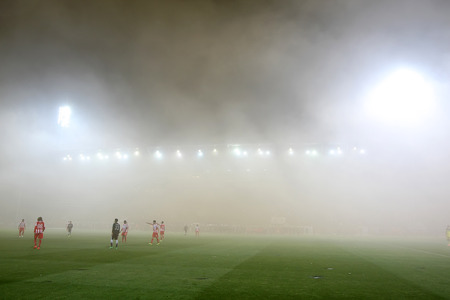 THESSALONIKI, GREECE APRIL 16, 2014 : Smoke all over the stadium during the Greek Cup Semi Final match PAOK vs Olympiacosのeditorial素材