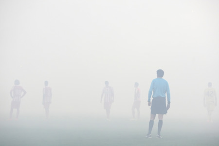 THESSALONIKI, GREECE APRIL 16, 2014 : Smoke all over the stadium during the Greek Cup Semi Final...
