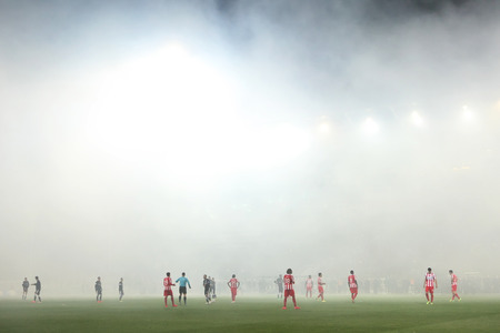 THESSALONIKI, GREECE APRIL 16, 2014 : Smoke all over the stadium during the Greek Cup Semi Final match PAOK vs Olympiacosのeditorial素材