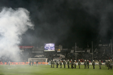 THESSALONIKI, GREECE APRIL 16, 2014 : Police in the field after the Greek Cup Semi Final match PAOK vs Olympiacosのeditorial素材