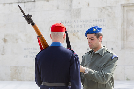 ATHENS, GREECE - APRIL 2, 2014: The Changing of the Guard ceremony takes place in front of the Greek Parliament Building のeditorial素材